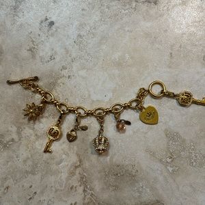 Juicy Couture charm bracelet with removable charms.
